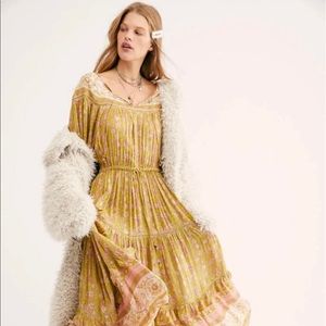 BNWT Spell / free people exclusive Delilah gown in colorway bronze.